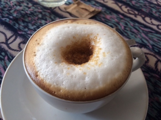 A DELICIOUS CAPPUCCINO THAT LOOKS LIKE A DONUT